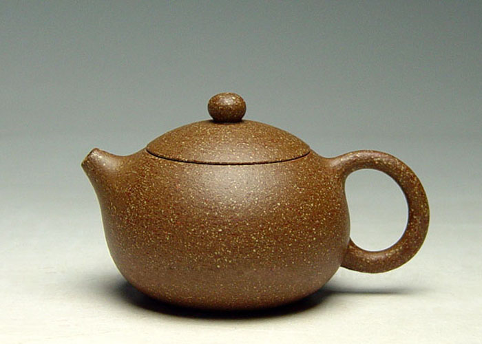 作品描述 有二种容量:280/120cc 拍得这把西施壶的照片一组,但是,照完