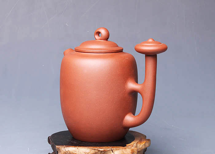 简形人体壶把耐人寻味