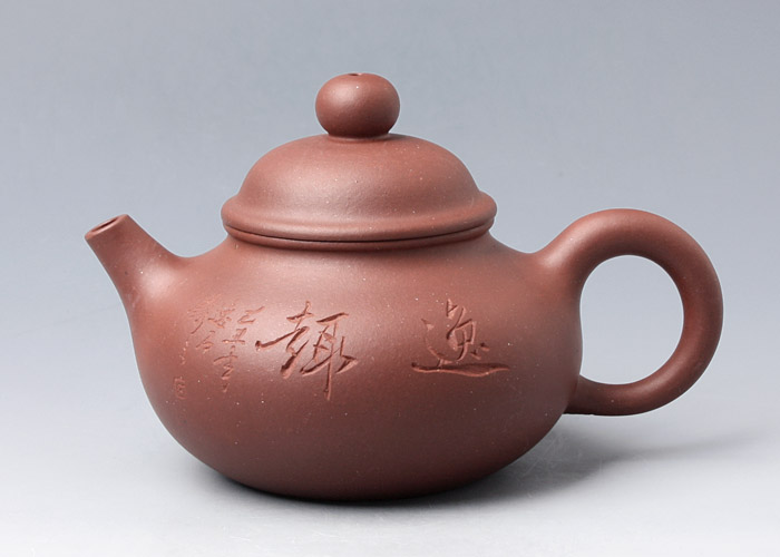 容天壶吕尧臣老师首创壶型,取材于佛教中的大肚罗汉,所谓大肚能容